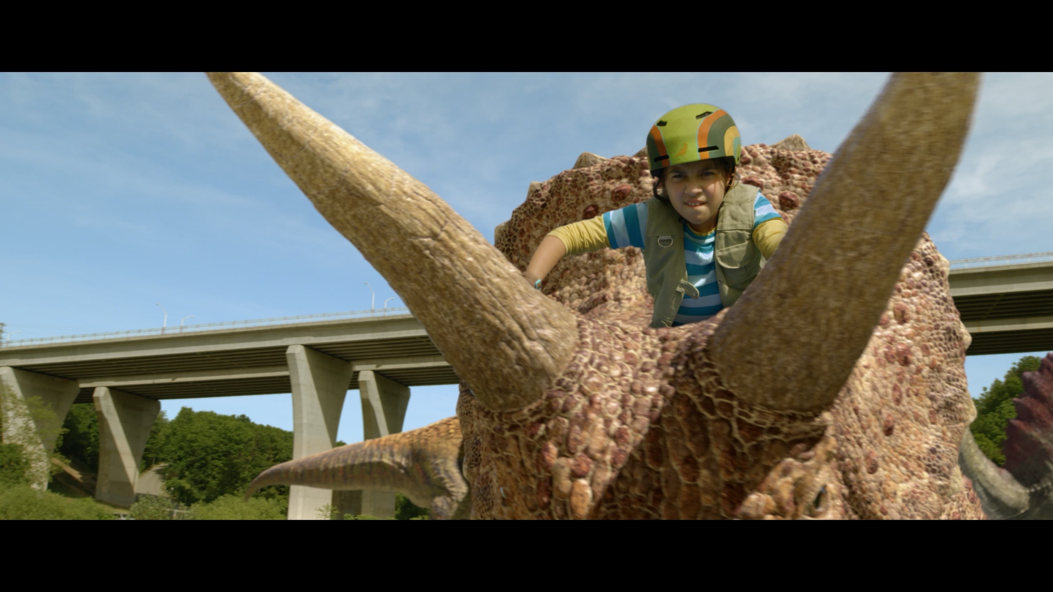 Dana riding Triceratops - 01